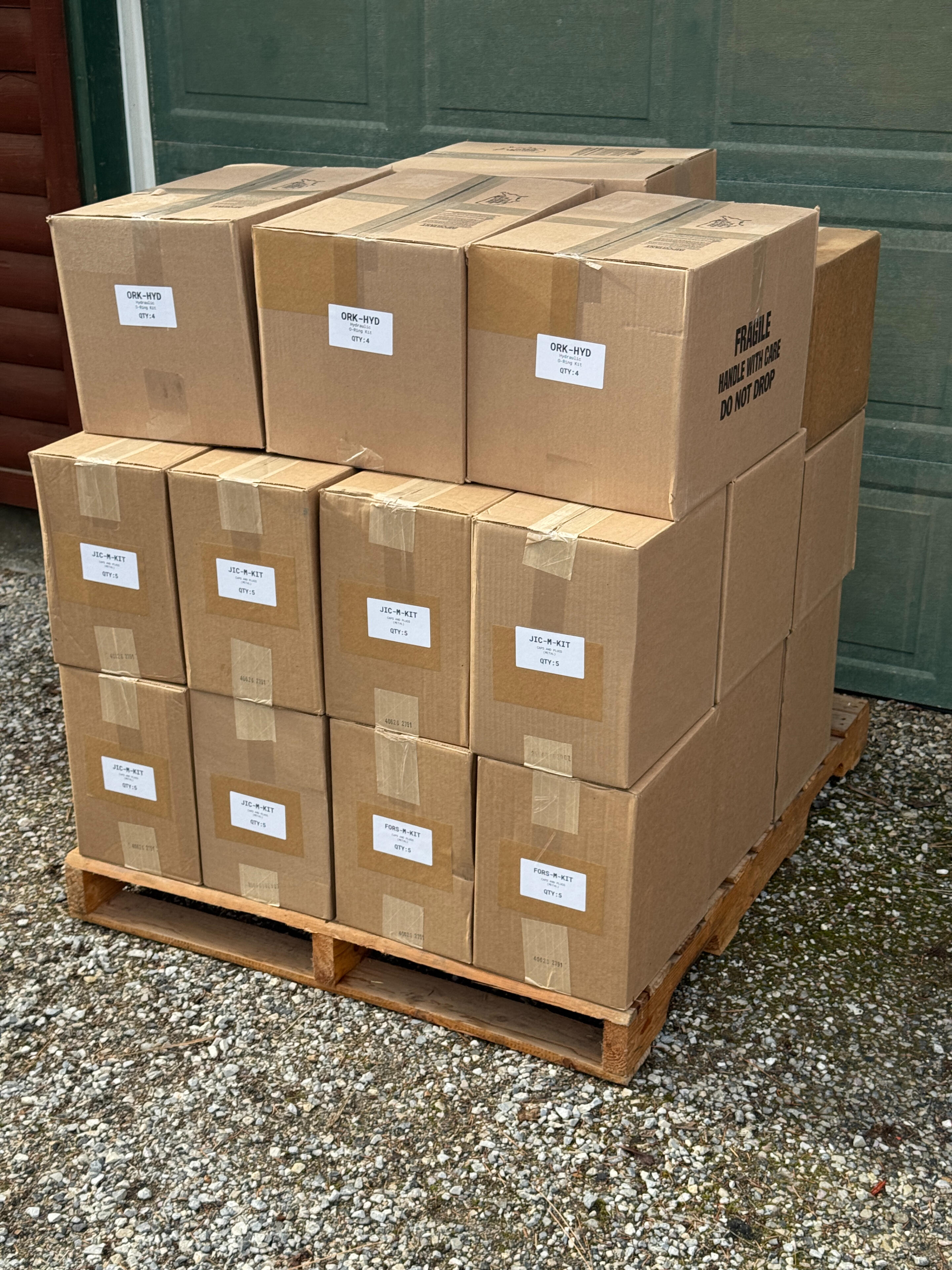 Private-label distributor assortment kits prepared on pallet for program shipment